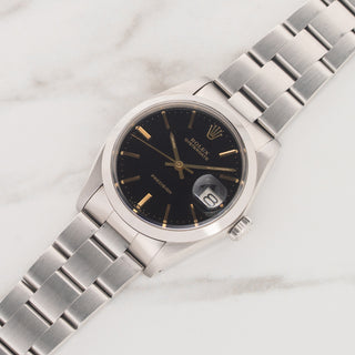 1980 Rolex Oysterdate Precision reference 6694 with black glossy gilt dial on an Oyster bracelet at Collectors Corner NY
