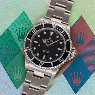 Rolex Submariner 14060M "Two Line" - Box/Papers & RSC Documentation