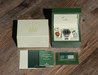 Complete full set including inner outer boxes warranty card hangtags and booklets for Rolex Submariner 14060M