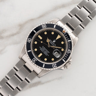 Unpolished 1984 Rolex Submariner Date reference 16800 transitional matte dial on a stainless steel Oyster bracelet at Collectors Corner NY