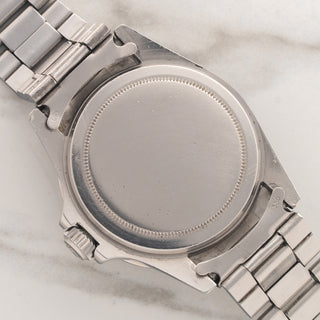 The stainless steel Oyster caseback and brushed lug undersides on a 1975 Rolex Submariner reference 5513