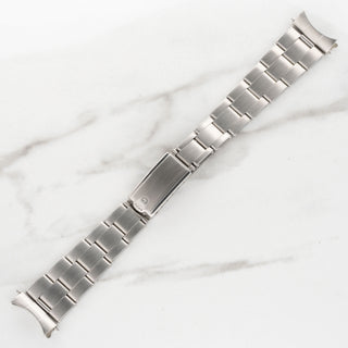 Top view of the pristine stainless steel rivet Oyster bracelet attached to a 1977 Tudor Ranger Date