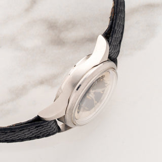 Side view displaying the slim 24mm automatic stainless steel case profile of a ladies Universal Genève Polerouter