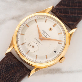 Angled shot highlighting the 18k pink gold sculpted lugs and two-tone sector dial on a Universal Genève Monodatic 100101