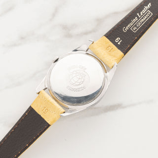 universal geneve polerouter date 204607 2-non luminous silver dial vintage watches collectors corner ny | Collectors Corner NY