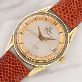 Angled shot highlighting the gold-capped twisted lugs and sector brushed dial on a Universal Genève Polerouter Date 869102/11