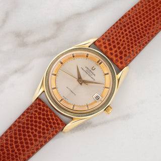 Universal Genève Polerouter Date reference 869102/11 gold-capped watch with sector dial on a cognac lizard strap at Collectors Corner NY