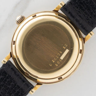 18k gold caseback view showing the clearly visible reference and serial number engravings on a Universal Genève 10234-12
