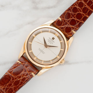 18k pink gold Universal Genève Polerouter De Luxe reference 10357-2 with crosshair dial on a brown leather strap at Collectors Corner NY