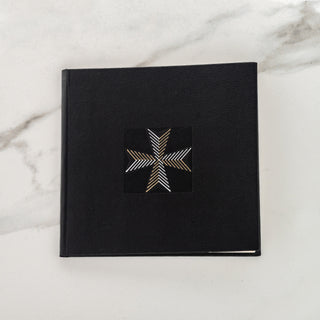 Original black Vacheron Constantin documentation booklet with silver Maltese cross logo