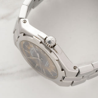 Side profile view showcasing the crown guards, signed winding crown, and case lines of a 37mm Vacheron Constantin Overseas