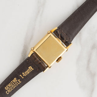 Clean 18k yellow gold caseback showing sharp edges and authentic Swiss gold hallmarks on a vintage Vacheron Constantin