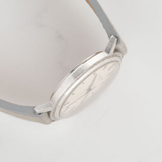 Side view highlighting the thick, evenly proportioned white gold lugs on a vintage Patek Philippe 3569