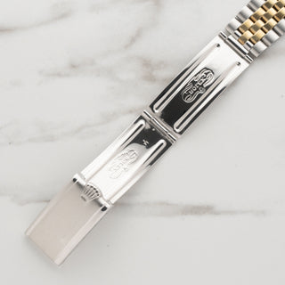 Inside view of the authentic vintage Rolex folded Jubilee clasp markings and folding blades
