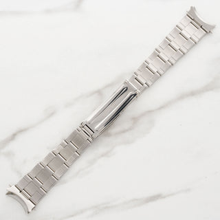 Inside look at the authentic vintage folding clasp mechanisms and steel bracelet links of a Tudor Ranger