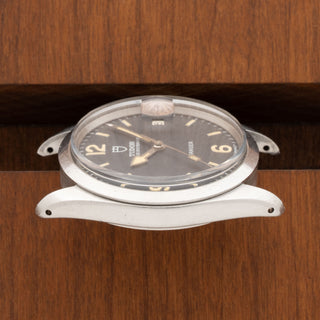 Opposite horizontal profile view displaying the thick, sharp, unpolished lugs of a vintage Tudor 9050-0