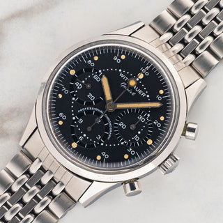 Angled shot highlighting the unpolished 38mm steel case, Valjoux 72 layout, and Kestermade Bambi bracelet on a Wittnauer 242T