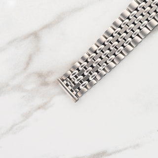 Top view displaying the stainless steel Kestermade Bambi bracelet links and end pieces for a Wittnauer 242T